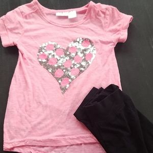 Cute girls t-shirt with heart sequin design.